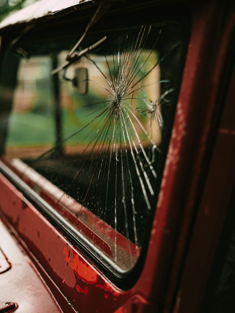 a bus is reflected in the side mirror