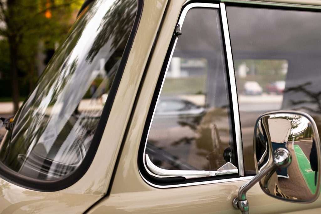 white car with open door